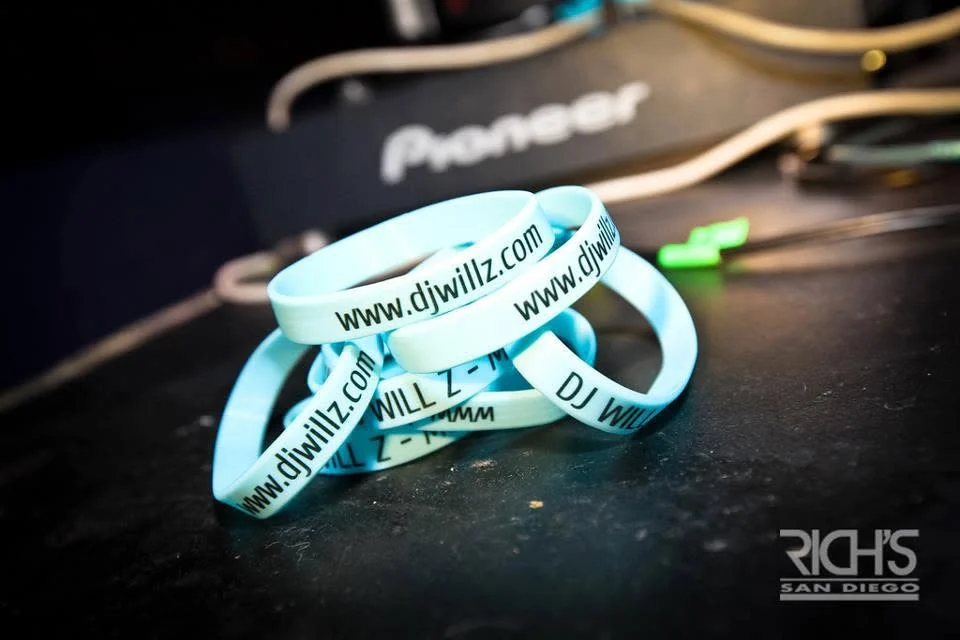 DJ Will Z promotional wristbands photographed at Rich's San Diego
