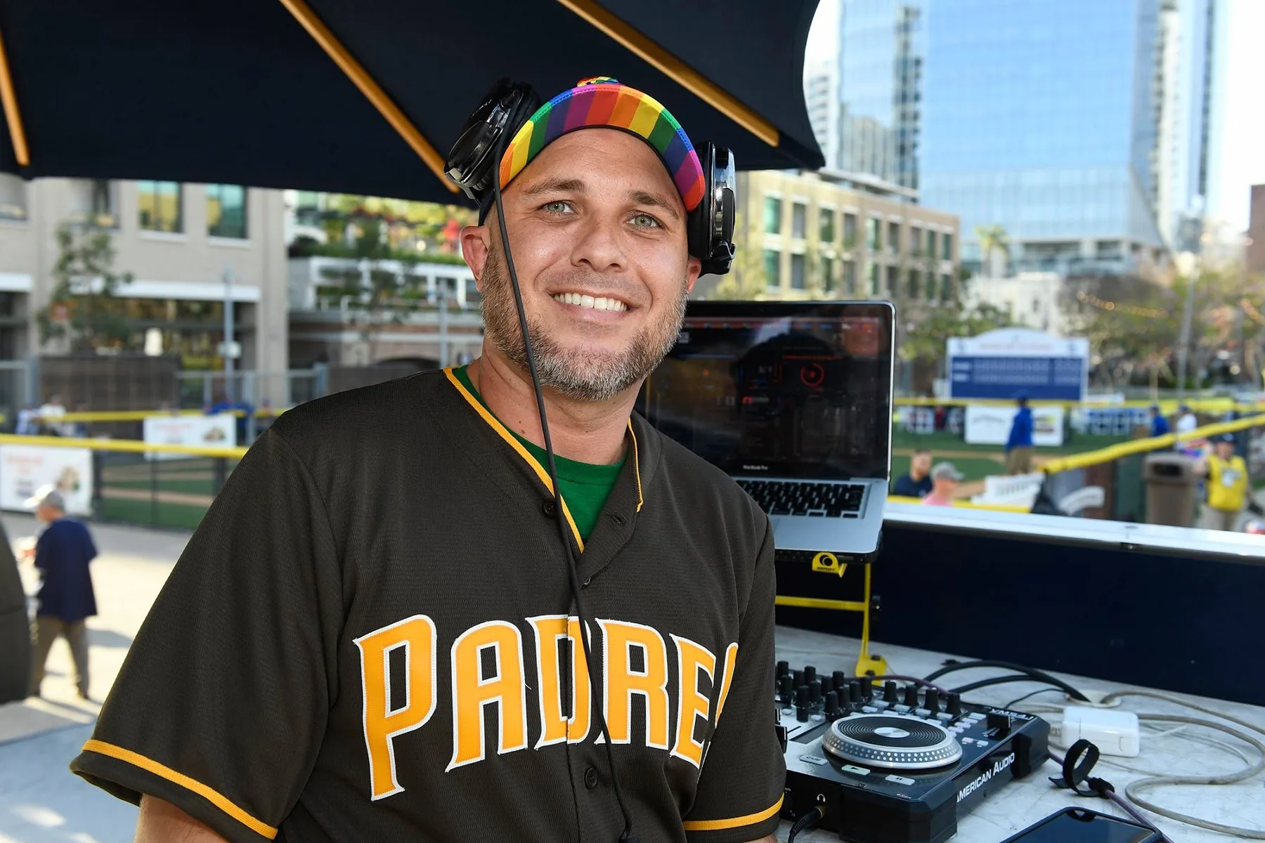 DJ Will Z working an outdoor Padres-themed DJ booth
