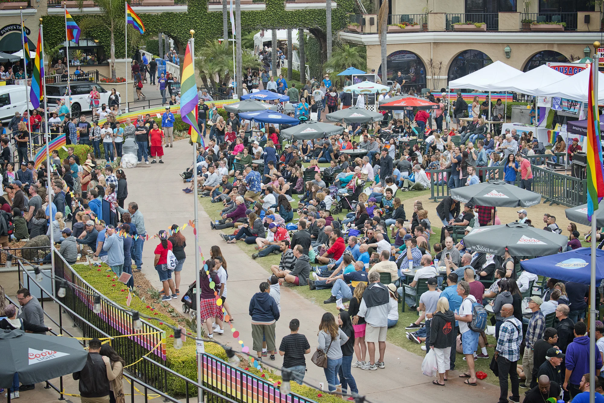 A large Out at the Fair crowd gathered around the fair stage