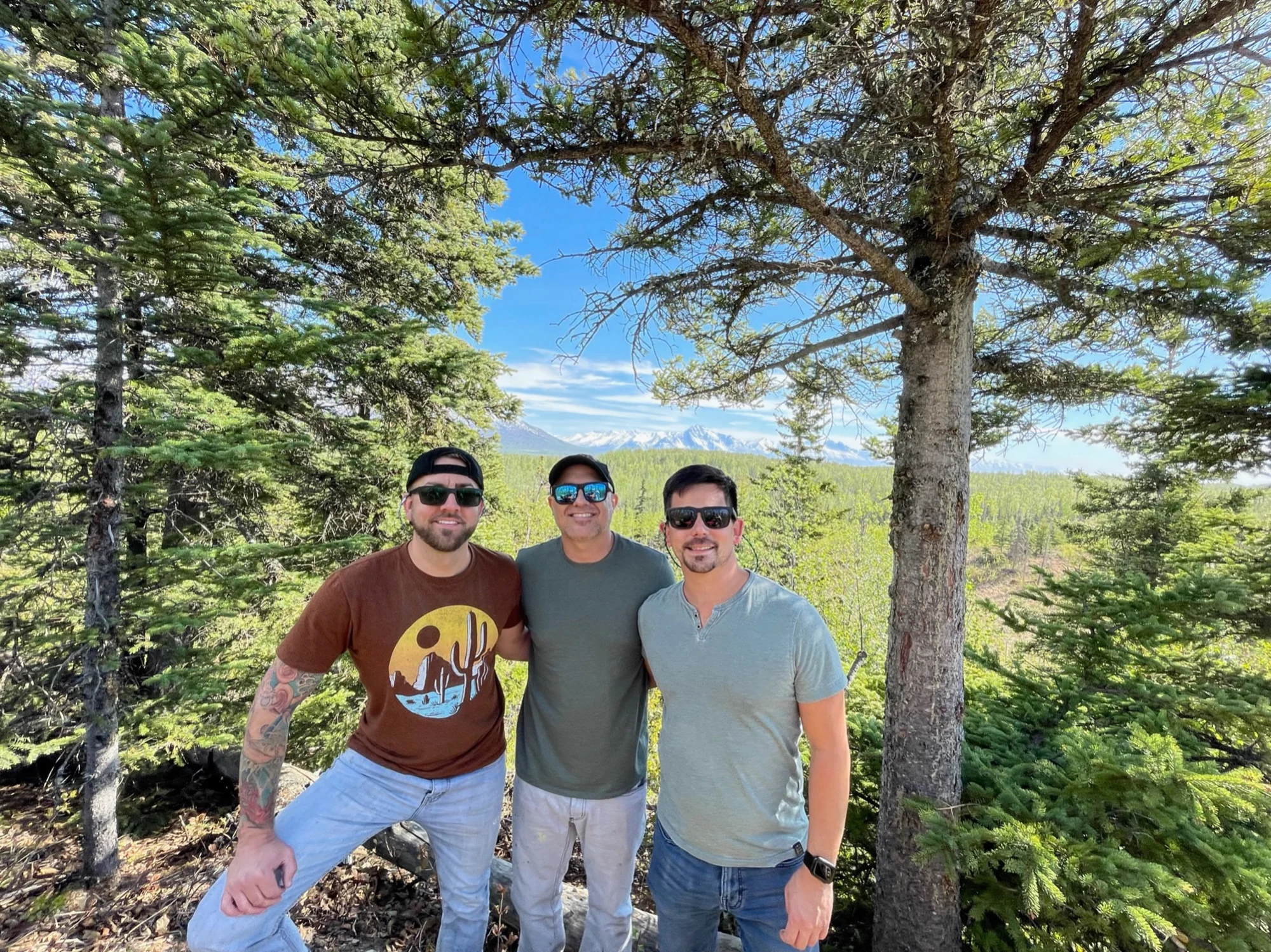 William, Caleb and Daniel at their favorite overlook near Palmer, Alaska, with Lazy Mountain across the valley